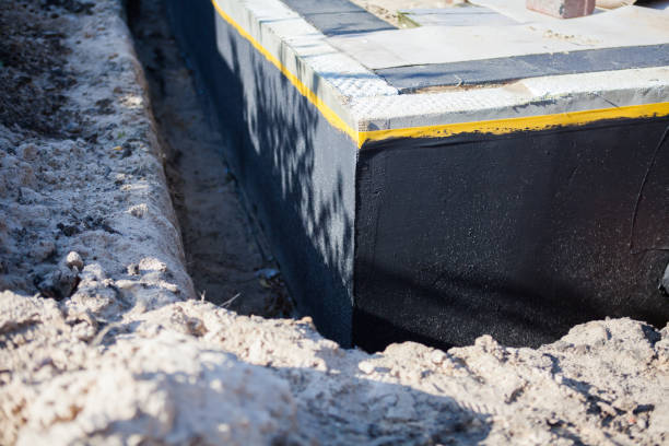 Professional Basement Waterproofing technician working in Whiteland, IN